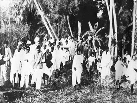 Gandhiji passing through a village during his Noakhali Peace Mission.jpg